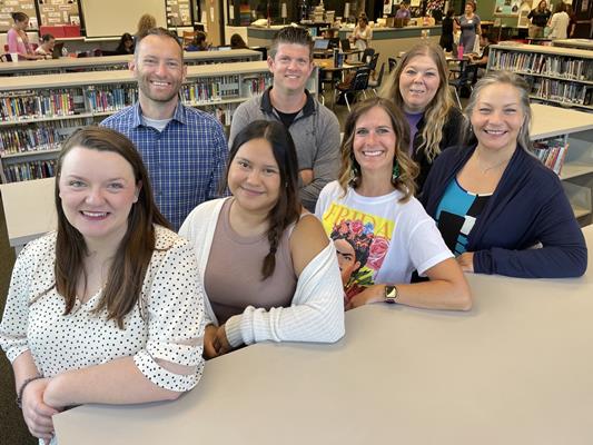 Group picture of seven new teachers.