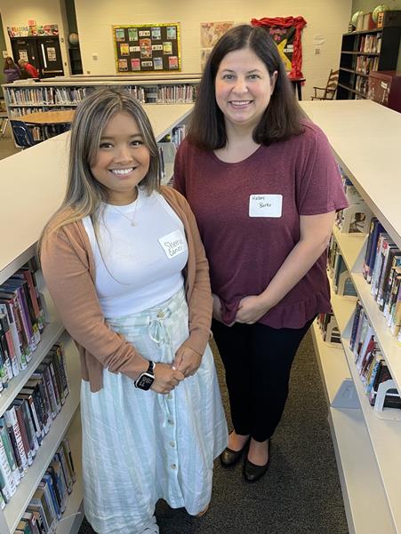 Posed picture of two new teachers